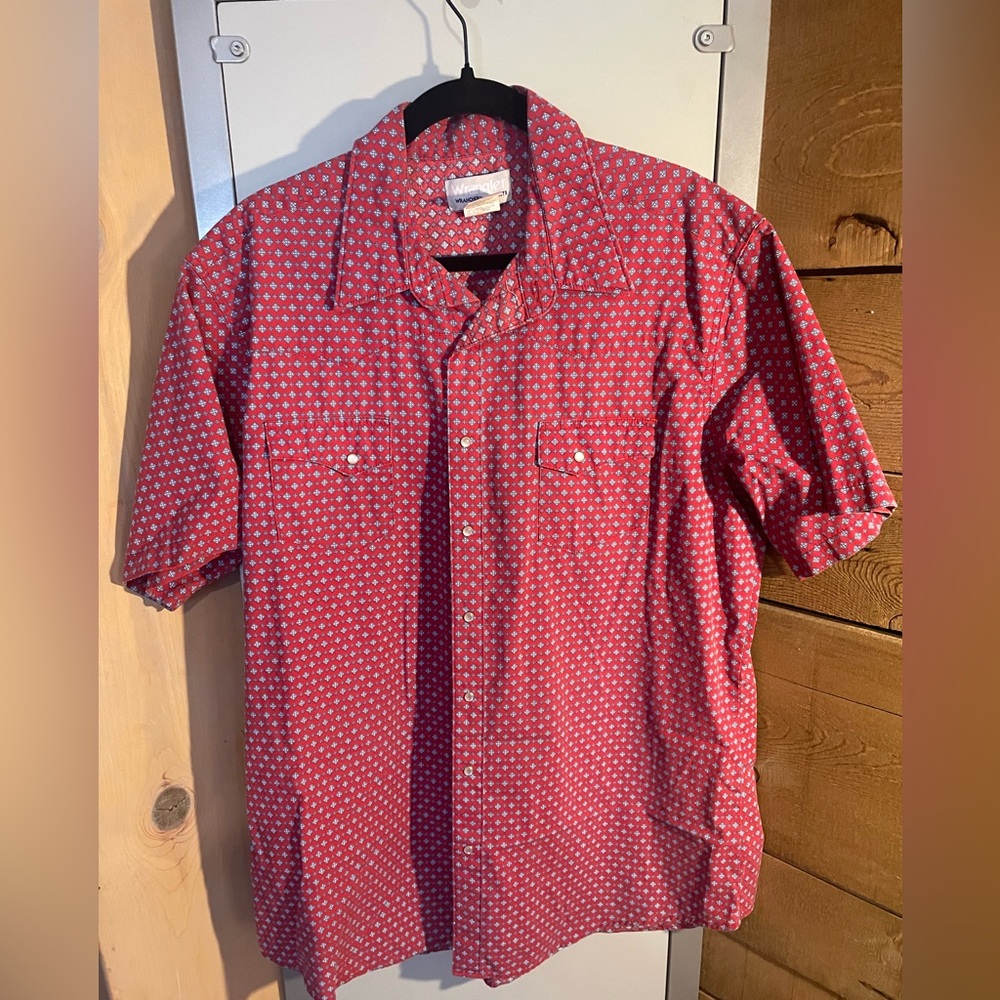 Wrangler Wrancher. XLT. Many hours have been worked on the farm in this shirt!